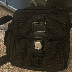Tumi junior crossbody unisex bag